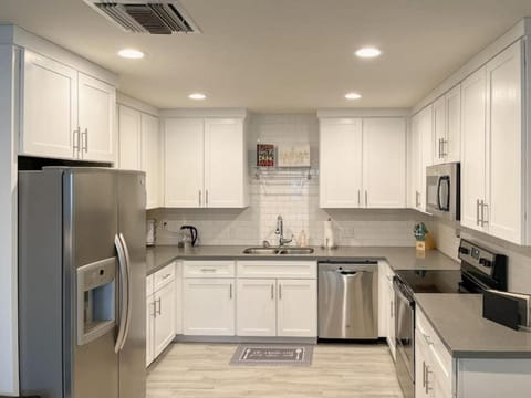 Kitchen or kitchenette, stove, dryer