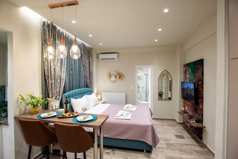 Bed, TV and multimedia, Seating area, Bedroom, air conditioner