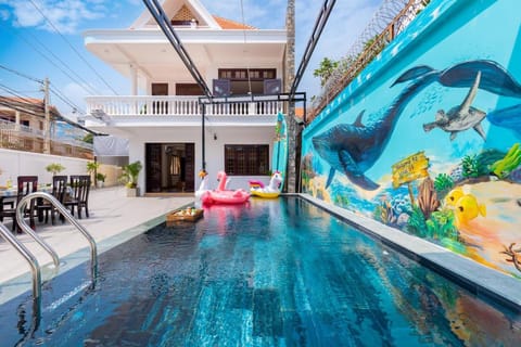 Property building, Patio, Day, BBQ facilities, Beach, Pool view, Swimming pool
