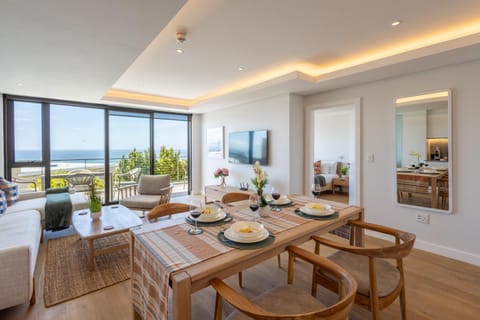Natural landscape, View (from property/room), Living room, Food and drinks, Seating area, Dining area, Sea view, Sunrise