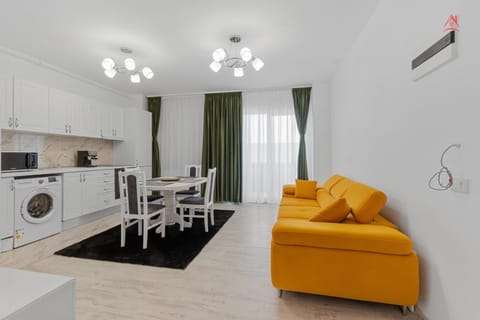 Kitchen or kitchenette, Living room, Seating area, Dining area, washing machine