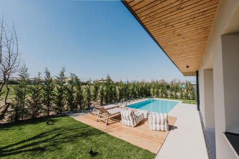 Property building, Living room, Swimming pool