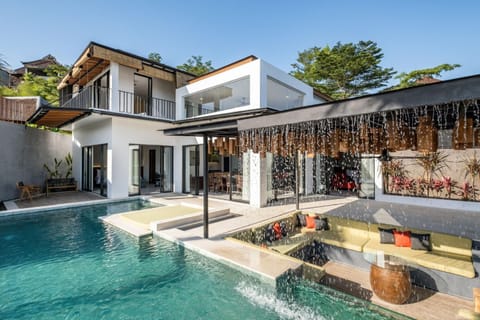 Property building, Patio, Pool view, Swimming pool, sunbed