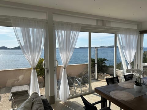 View (from property/room), Balcony/Terrace, Seating area, Sea view