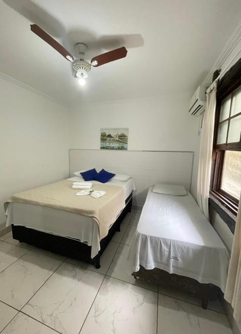 Bed, Photo of the whole room, Bedroom, towels, air conditioner