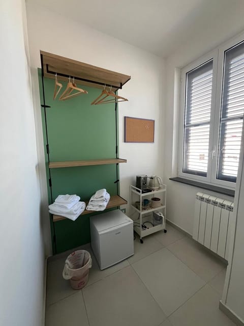 minibar, towels, wardrobe