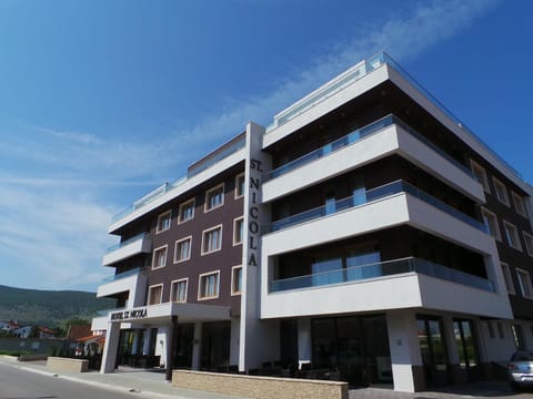 Property building, Facade/entrance, Day