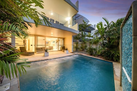 Property building, Patio, Pool view, Swimming pool, sunbed