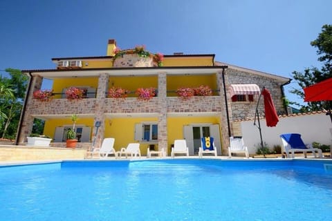 Property building, Pool view, Swimming pool, sunbed