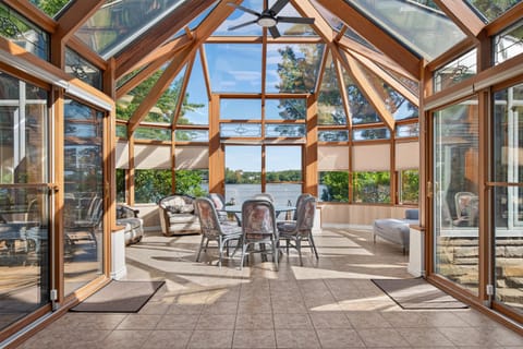 Patio, Day, View (from property/room), Living room, Seating area, Dining area, River view, fireplace, fireplace