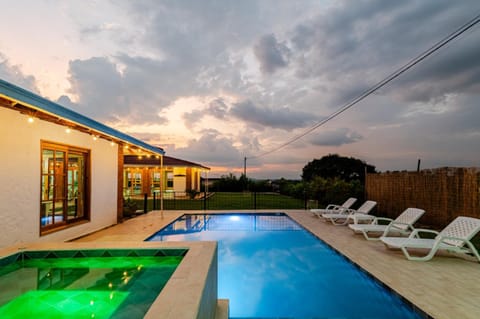 Patio, Off site, Day, Natural landscape, Pool view, Swimming pool, Sunrise, Sunset, sunbed