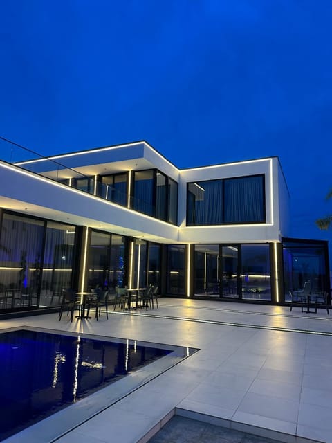 Property building, Night, Pool view, Swimming pool