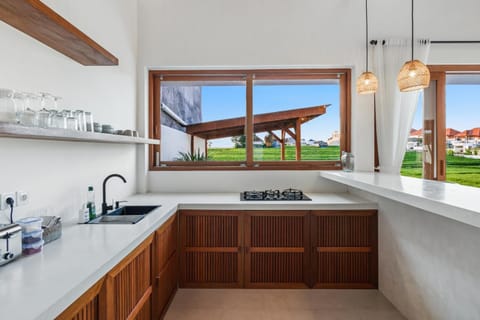 Kitchen or kitchenette, stove, toaster