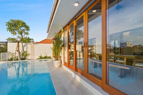 Property building, Patio, Day, Pool view, Swimming pool