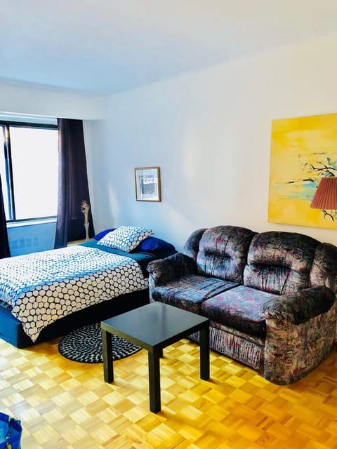 Bed, Living room, Seating area, Bedroom