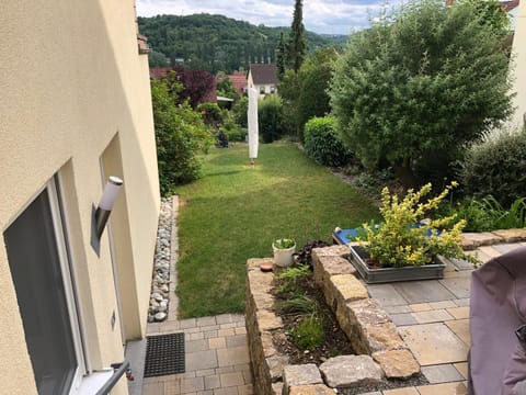 Property building, Patio, Spring, Natural landscape, Children play ground, Garden, View (from property/room), Garden view