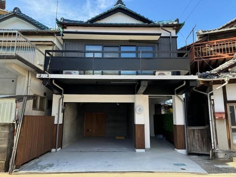 Property building, Facade/entrance, Day, Parking