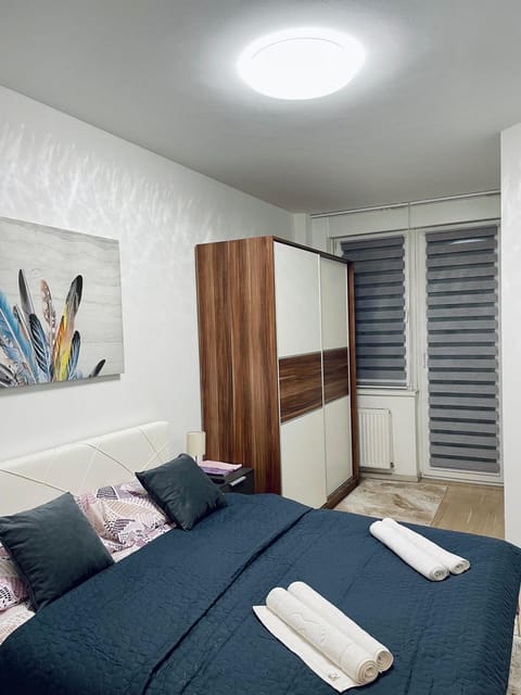 Bed, Photo of the whole room, Bedroom, towels, wardrobe