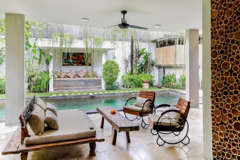 Living room, Seating area, Garden view, Swimming pool