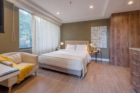 Bed, Living room, Photo of the whole room, Seating area, Bedroom, wardrobe