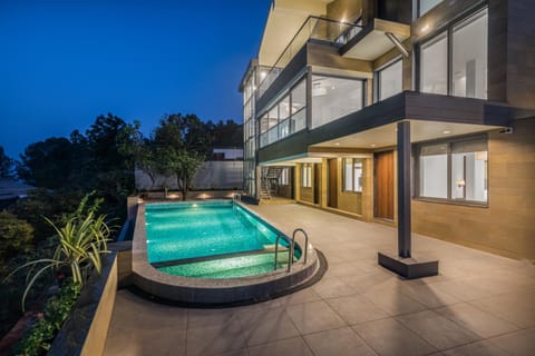 Property building, Facade/entrance, Night, Pool view, Swimming pool
