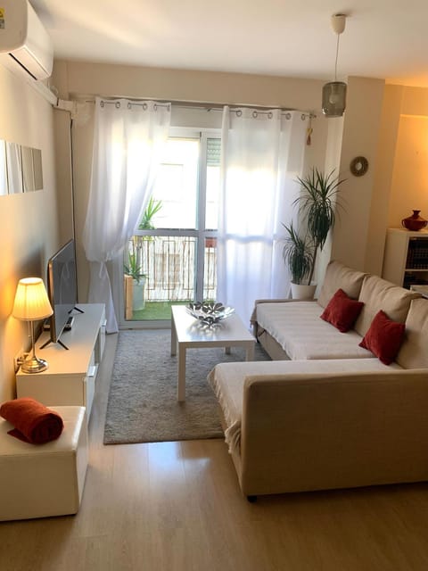 Bed, Living room, Seating area, Bedroom