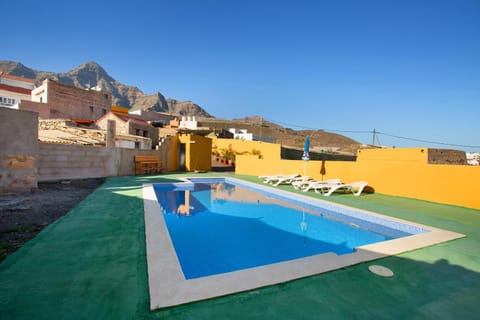 Property building, Living room, Swimming pool