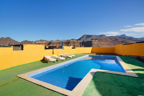 Property building, Living room, Swimming pool