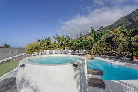 Property building, Living room, Swimming pool