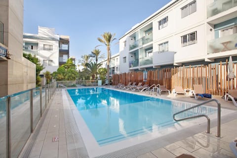 Property building, Living room, Swimming pool