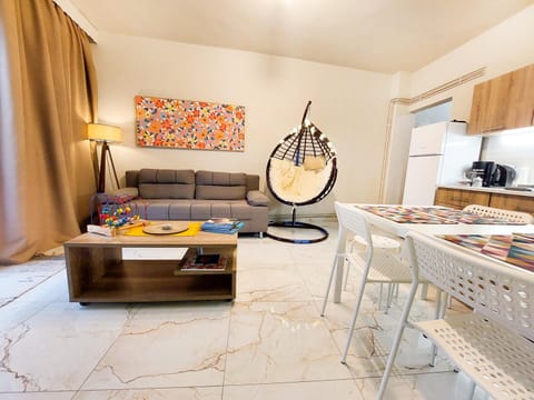 Kitchen or kitchenette, Living room, Seating area, Dining area