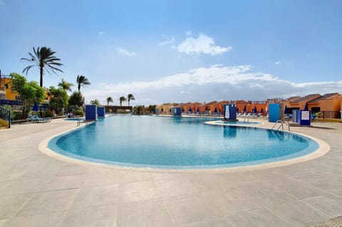 Property building, Living room, Swimming pool