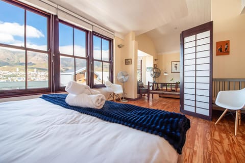 Bed, Natural landscape, Living room, Seating area, Bedroom, Mountain view, fireplace, furniture, heating, towels