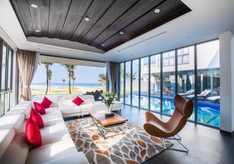 Living room, Seating area, Beach, Pool view, Sea view