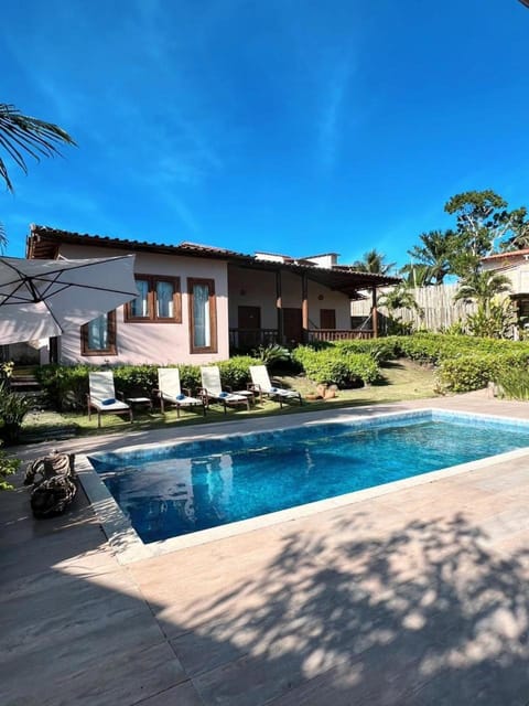 Property building, Day, Pool view, Swimming pool, sunbed