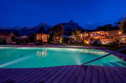 Property building, Night, Natural landscape, Mountain view, Pool view, Swimming pool