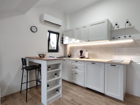 Kitchen or kitchenette, stove