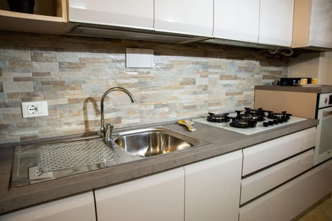 Kitchen or kitchenette, stove