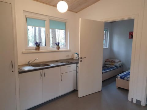 Bedroom, bunk bed, kitchen