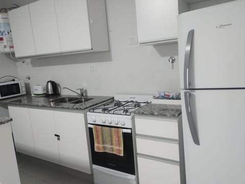 Kitchen or kitchenette, oven, toaster