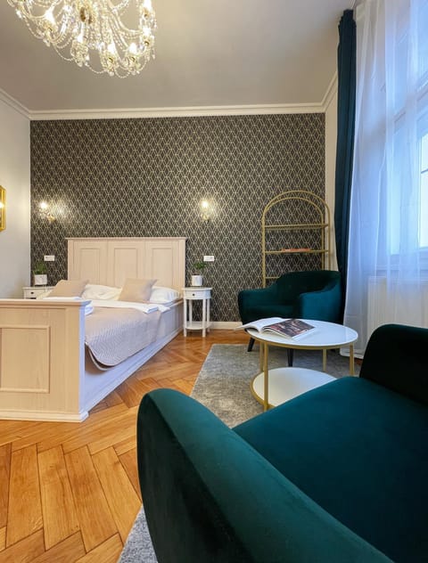 Bed, Living room, Seating area, Bedroom