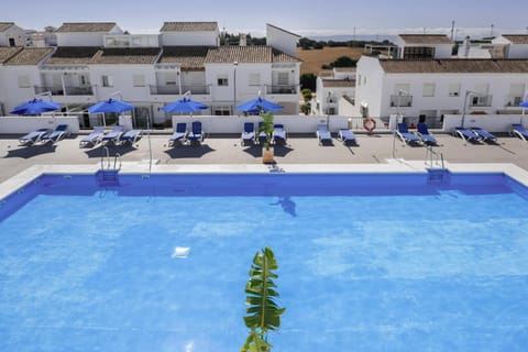Property building, Living room, Swimming pool