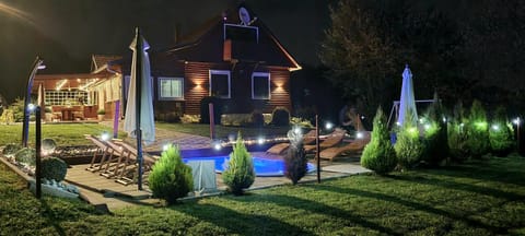 Property building, Night, Natural landscape, Garden, Garden view, Pool view, Swimming pool, sunbed
