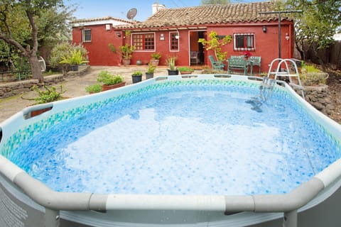 Property building, Living room, Swimming pool