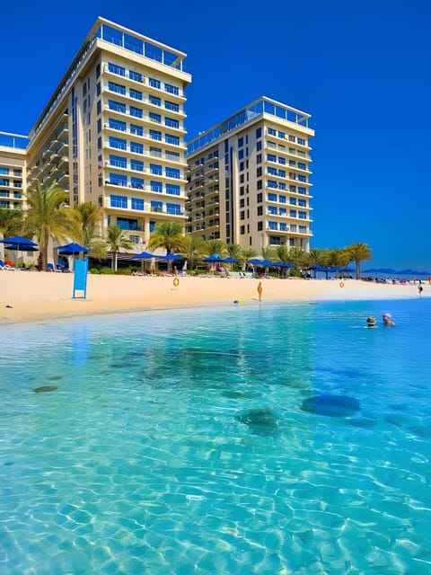 Property building, Nearby landmark, Day, Natural landscape, Beach, Sea view, sunbed