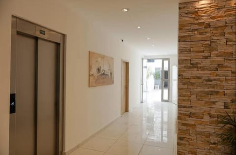 Property building, elevator