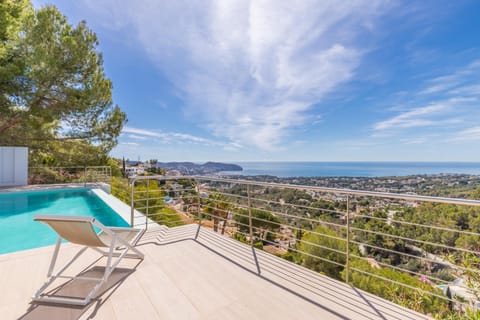 Property building, Living room, Swimming pool
