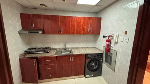 Kitchen or kitchenette, dishwasher, washing machine