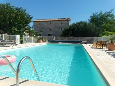 Property building, Living room, Swimming pool