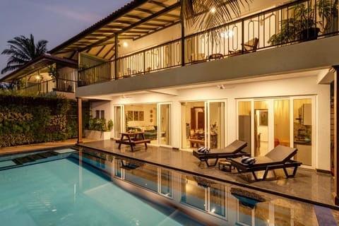 Property building, Night, Seating area, Pool view, Swimming pool, sunbed